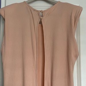 Fitted romper with flowy pant leg. New with tags!